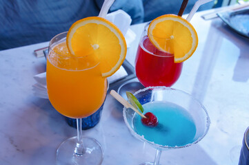 3 drinks of cocktails on the table