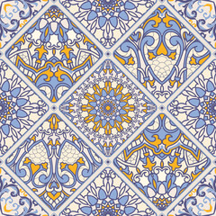 Seamless colorful patchwork. Azulejos tiles patchwork. Majolica pottery tile, blue, yellow azulejo. Original traditional Portuguese and Spain decor. Islam, Arabic, Indian, Ottoman motifs