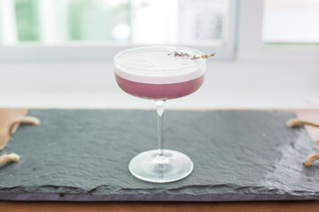 Delicious and refreshing fruity cocktail drink topped with egg white froth