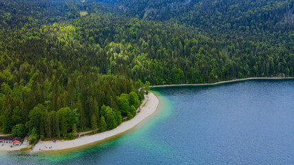 Obraz premium Wonderful Eibsee in Bavaria at the German Alps from above - aerial view