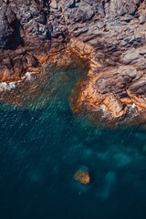 Fototapeta na wymiar Aerial seascape stock photo of drone of rocks next to the blue Mediterranean sea