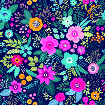 Amazing seamless floral pattern with bright colorful flowers and leaves on a dark blue background. The elegant the template for fashion prints. Modern floral background. Folk style © ann_and_pen
