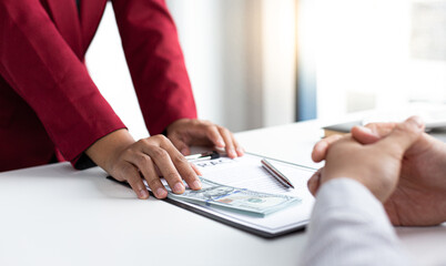 Businessmen give dollars to bribe employees in signing contracts to buy illegal land and real...