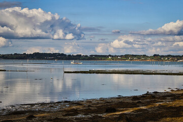 small cumulus clouds over the sea