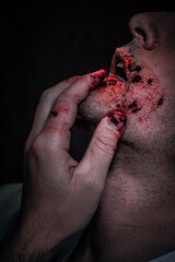face in profile, bloody mouth