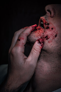face in profile, bloody mouth