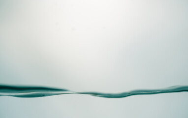 Background of pure water wave is swaying in the glass.