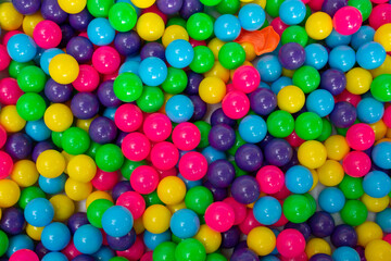Fototapeta na wymiar Multi color vibrant plastic ball in kids playing station.