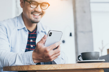 using cell phone.hand man holding texting message on screen mobile chatting,search internet...