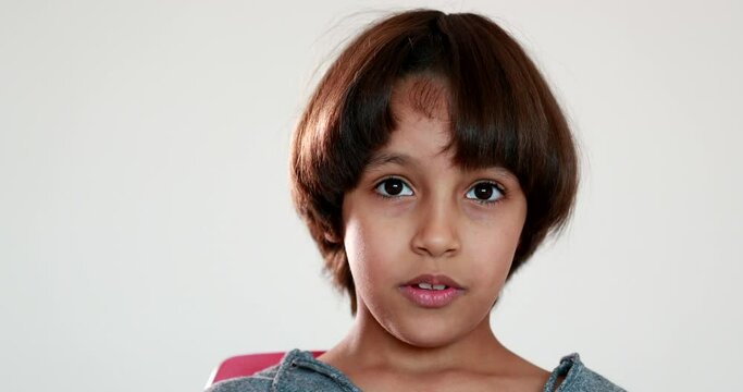 charismatic beautiful child boy smiling to camera