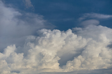 Fototapeta premium The fluffy cloud in the rainy season