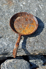 rusted metal cooking pan