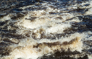 Thresholds on the river. Water texture