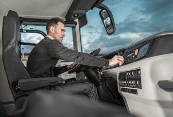 International Motor Coach Bus Driver Preparing For Another Trip