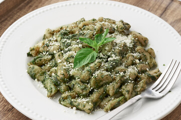 Gnocchi al pesto, traditional Italian dish made of fresh basil, olive oil, pine nuts.