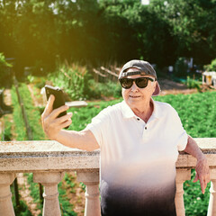 Elderly woman trying out her smartphone