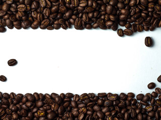 Roasted Brown Coffee Beans Isolated on white background For entering text.