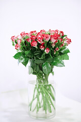 Bouquet of red roses in vase