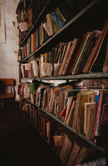 old library with shabby books at a village school
