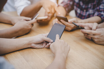 group teenage use mobile phone share wifi and social media connect