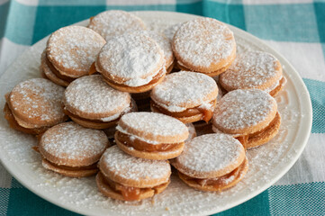 Alfajores: Traditional Peruvian cookies filled with caramel and white sugar dust on top.