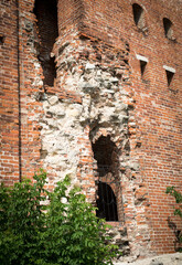 old brick wall with arch