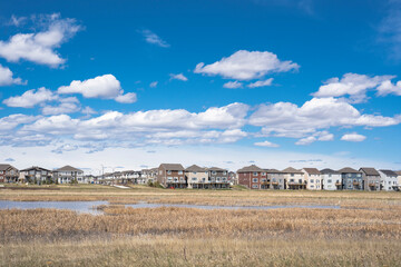 Calgary, Alberta, Canada, June 01 2020:  An subdivision developed up to designated habitat at the...