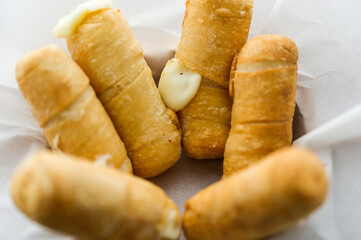 Tequeños authentic original Venezuelan appetizer. Deep fried filled with artisan white cheese.