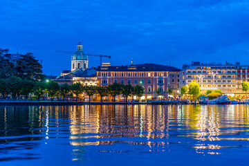 Night cityscape of Italian town Como