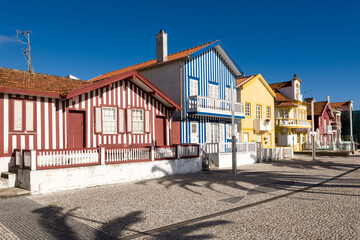 Fototapeta na wymiar Fisherman typical striped houses in Costa Nova, Aveiro, Portugal