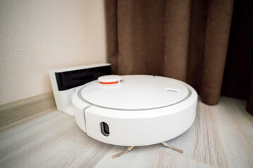 Vacuum cleaner robot on charging dock station