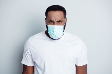 Photo of crazy annoyed irritated dark skin african guy protester community protest demonstration police lawlessness hate politics lies wear t-shirt facial mask isolated grey color background