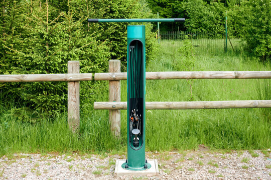 Bike air pump station. Public station with bicycle repair tools