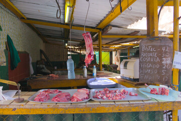 Obraz na płótnie Canvas Meat hanging in shop in La Habana, Cuba