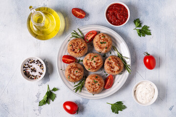 Fresh chiken cutlets with tomatoes and rosemary