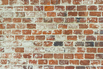 Obraz premium brick red wall. background of a old brick house.