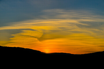 Breathtaking fire pastel sunset over the vineyards of Moselle river valley in Germany in Bernkastel-Kues

