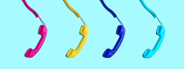 Colorful old fashioned telephones overhead view - flatlay