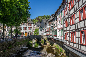 Fototapeta na wymiar Monschau town in Germany street view with half-timbered houses and Rur river - a small resort town in the Eifel region of western Germany, located in the Aachen district of North Rhine-Westphalia 