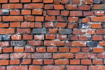 brick red wall. background of a old brick house.