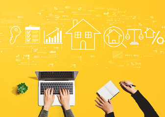 Real estate theme with people working together with laptop and notebook