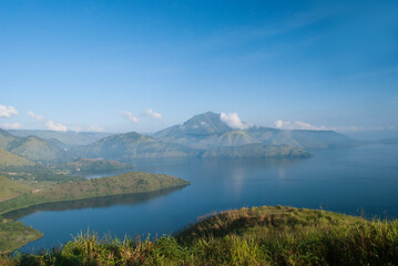 The view of Lake Toba and Samosir Island from the Holbung Hill in North Sumatra, Indonesia