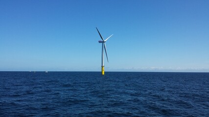 wind turbine in the sea © Matvejs