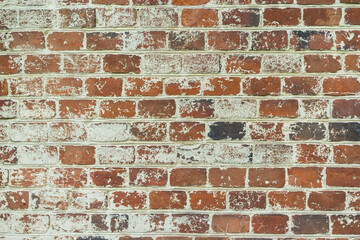 brick red wall. background of a old brick house.