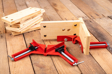 Joining wood using a carpentry clamp. Small carpentry work.