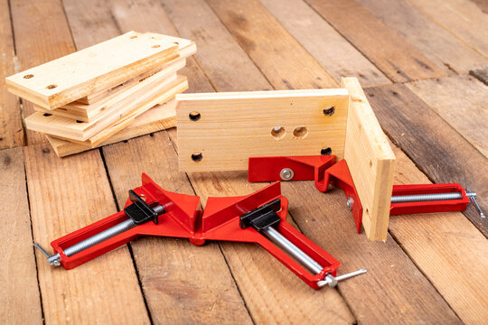 Joining wood using a carpentry clamp. Small carpentry work.