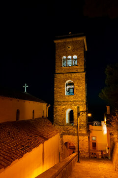 Italy, Campania, Castellabate - 12 August 2019 - Night view of the bell tower of the Pontifical Basilica of Santa Maria de Gulia in Castellabate