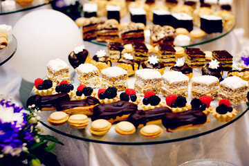 this is a beautiful table with small desserts