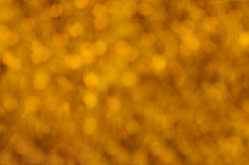 Golden shiny abstract bokeh background