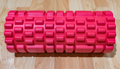 Red foam roller with bumpy knobs